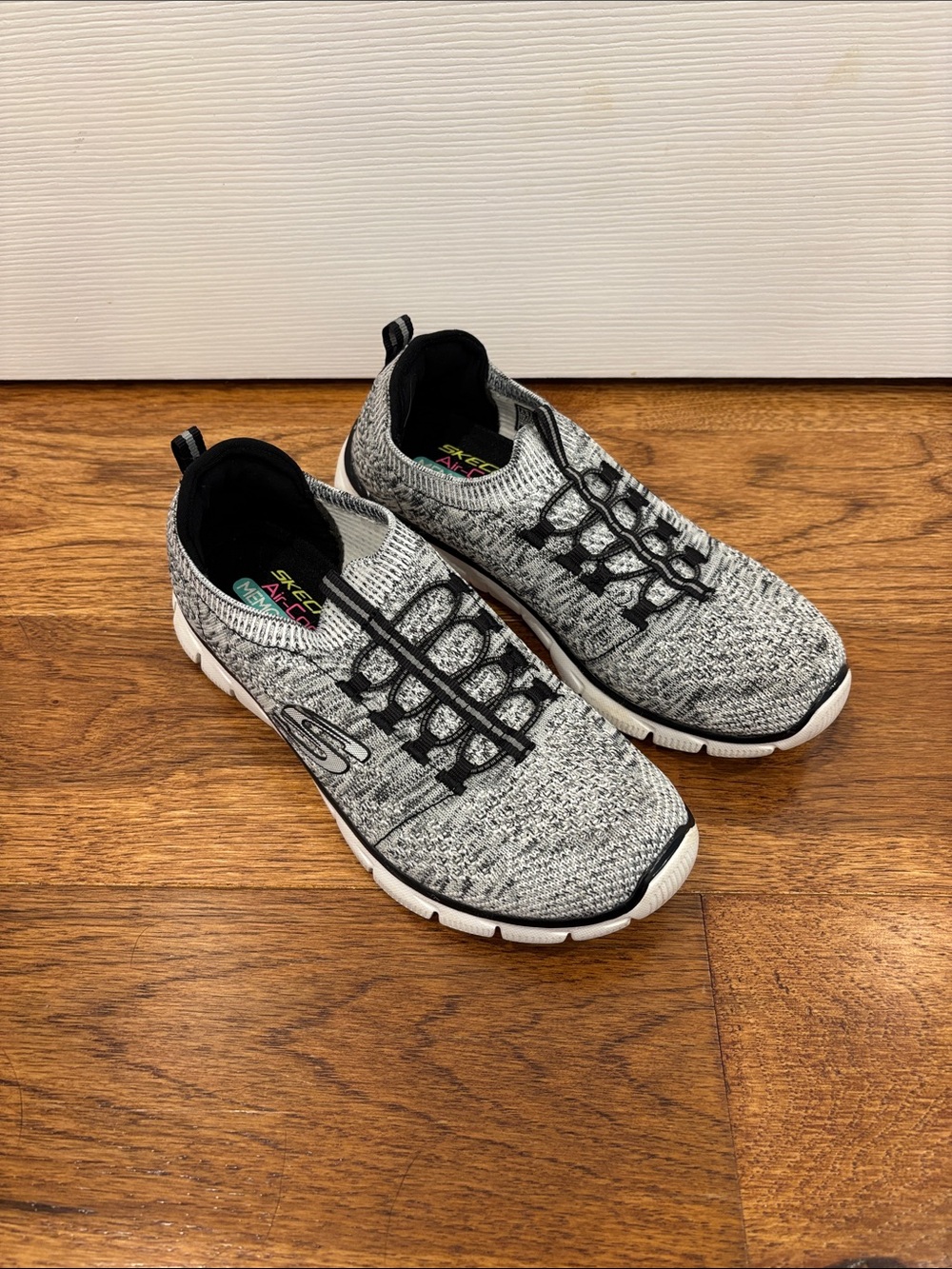 Skechers Black and White Knit Slip-On Athletic Sneakers
